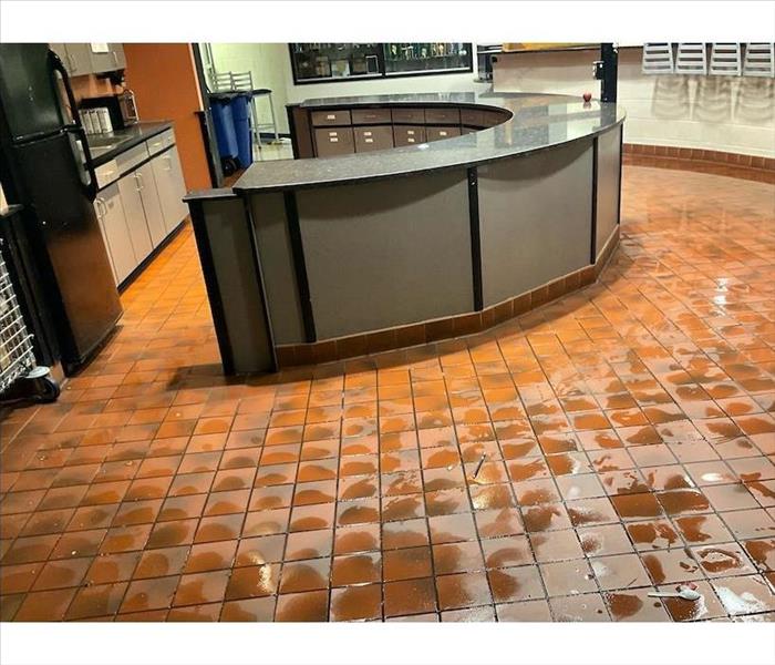 wetness on tiles in breakroom
